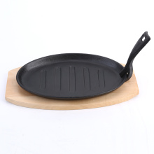 sizzler plate with wooden base cast iron